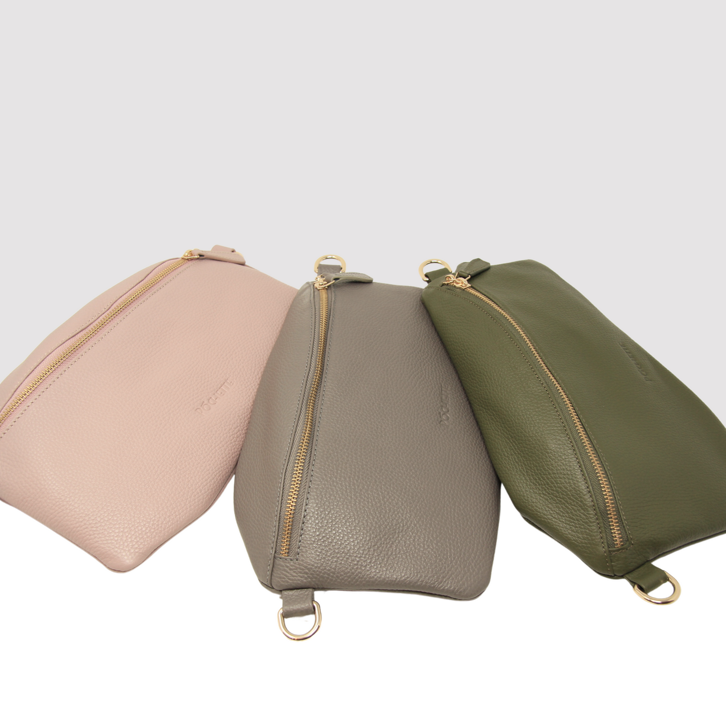 Three Póca handbags in powder pink, taupe and olive green
